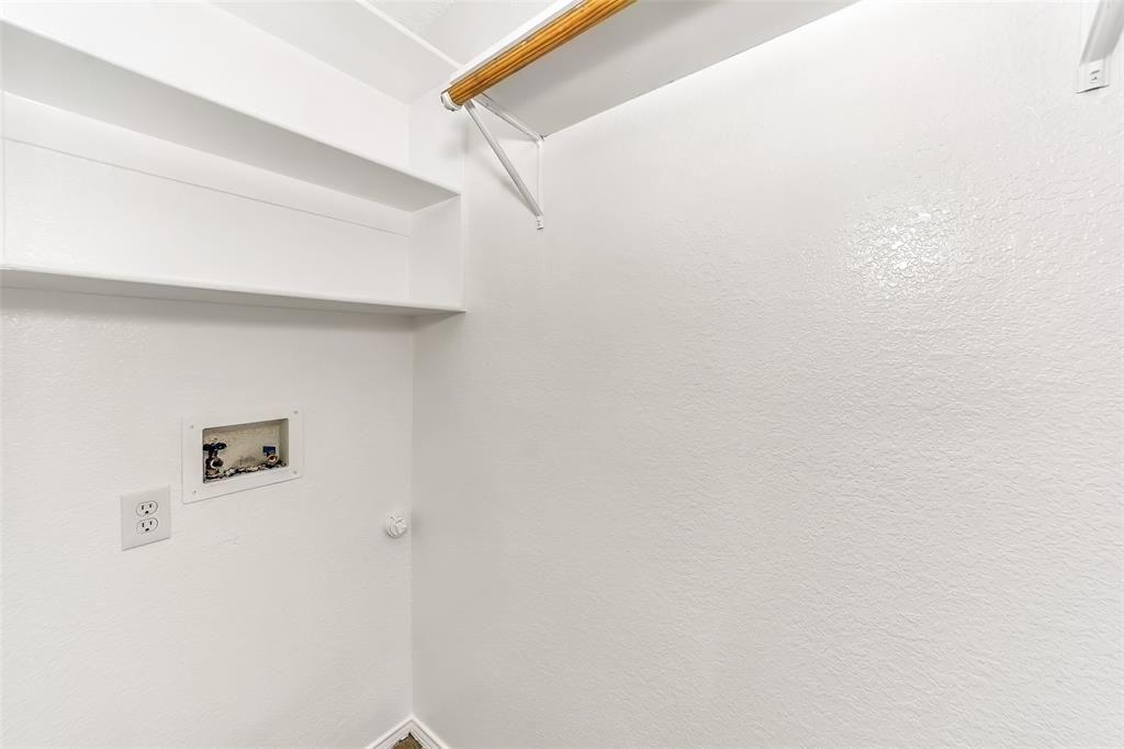 1006 Buckingham Drive Forney, TX 75126 - Photo 24 of 31 a view of door with cabinets