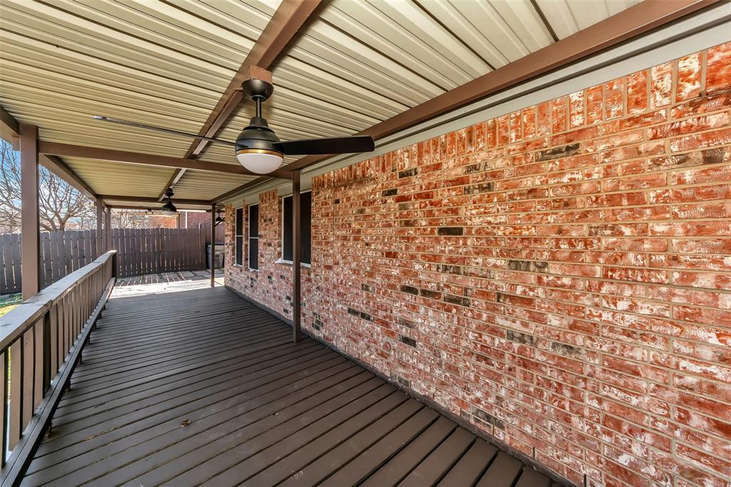 1006 Buckingham Drive Forney, TX 75126 - Photo 27 of 31 a view of a porch with wooden floor