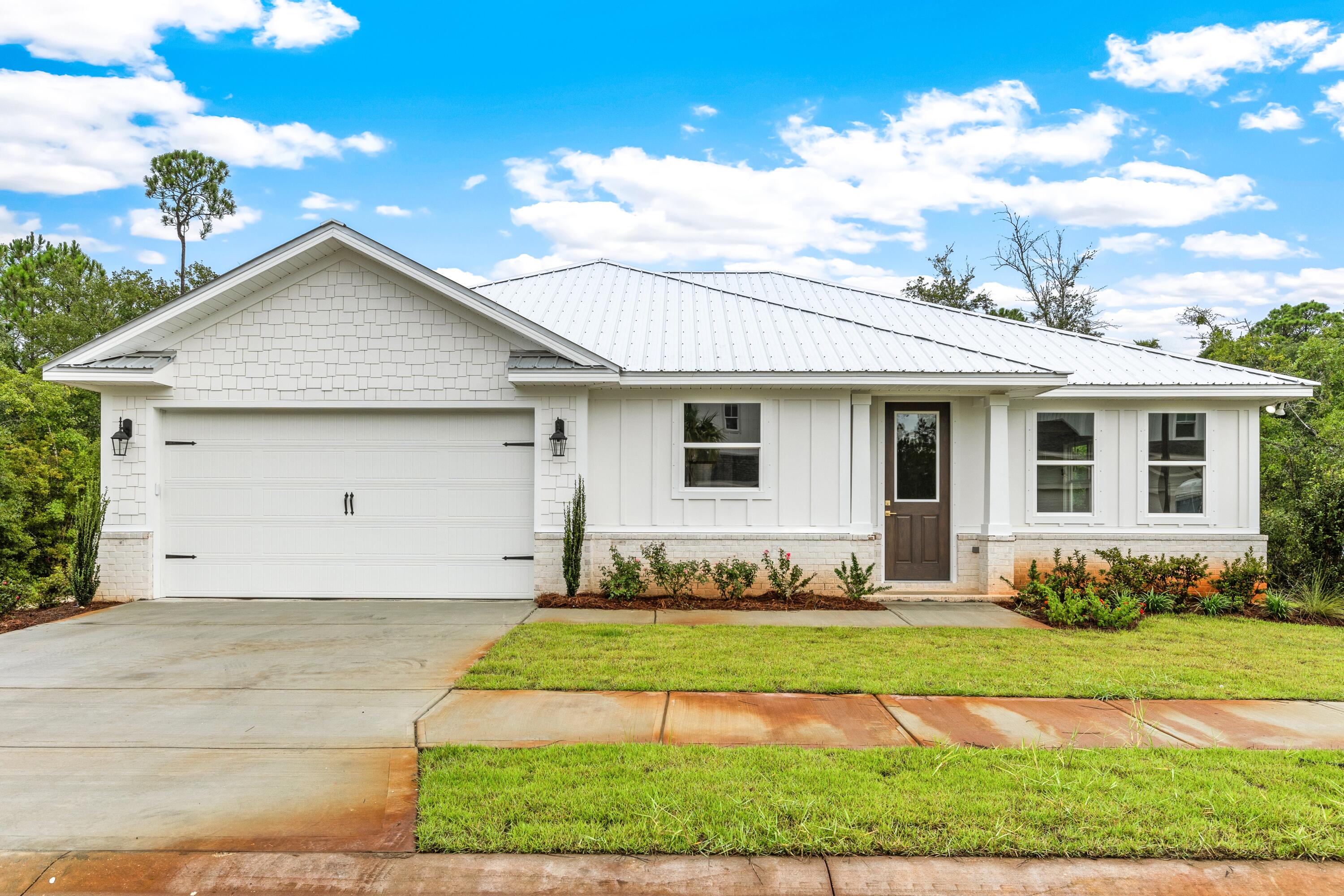 160 Clarke Hl Road Freeport, FL 32439 - Photo 17 of 34 a front view of a house with a yard