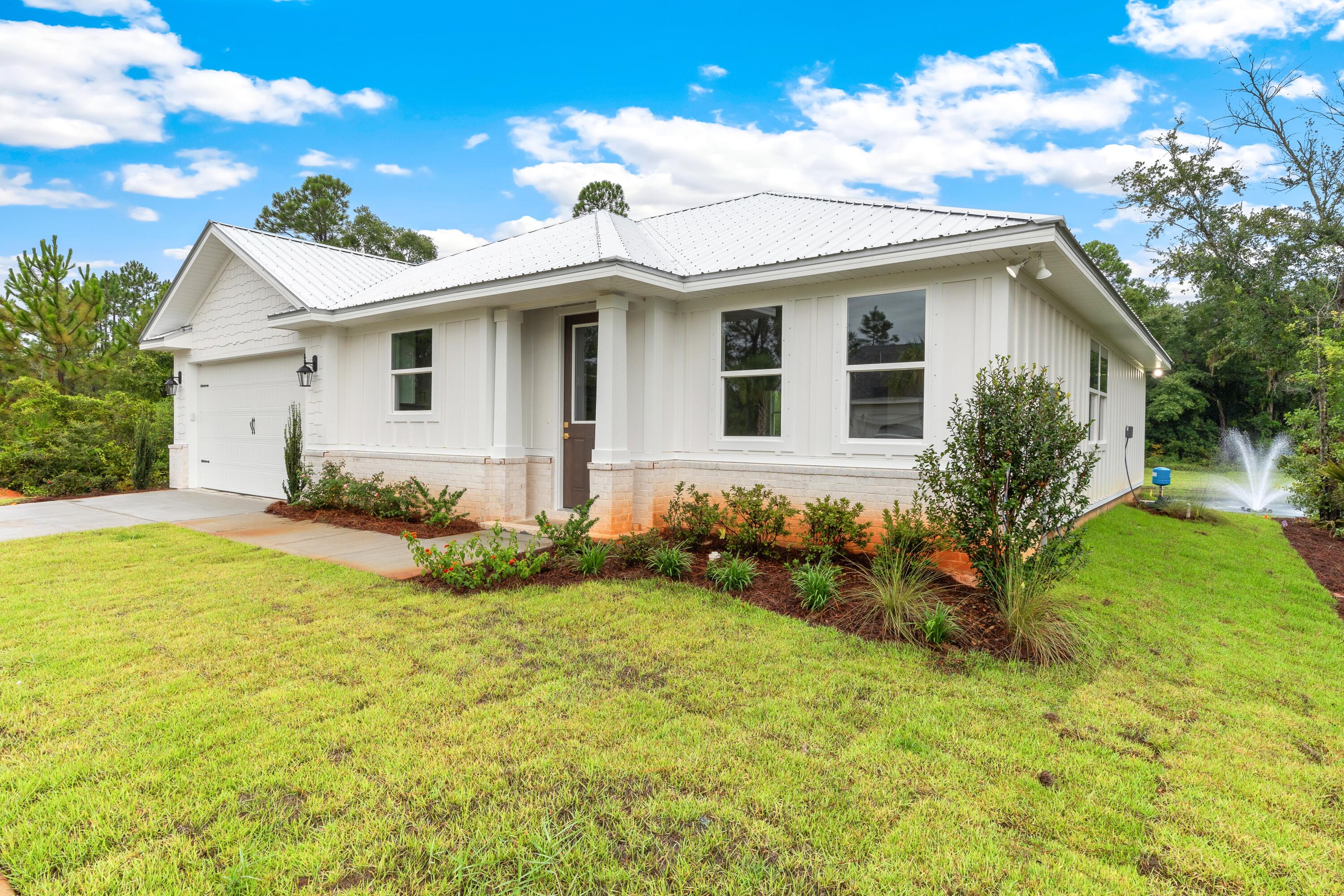 160 Clarke Hl Road Freeport, FL 32439 - Photo 18 of 34 a view of a house with a yard