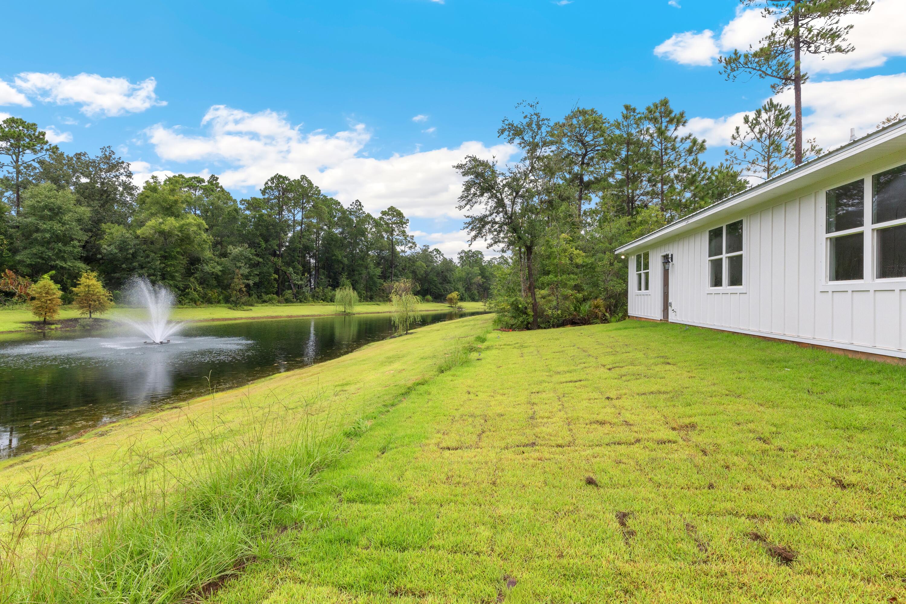 160 Clarke Hl Road Freeport, FL 32439 - Photo 19 of 34 a view of a house with a yard