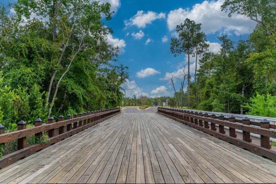 160 Clarke Hl Road Freeport, FL 32439 - Photo 23 of 34 a view of a balcony with wooden floor
