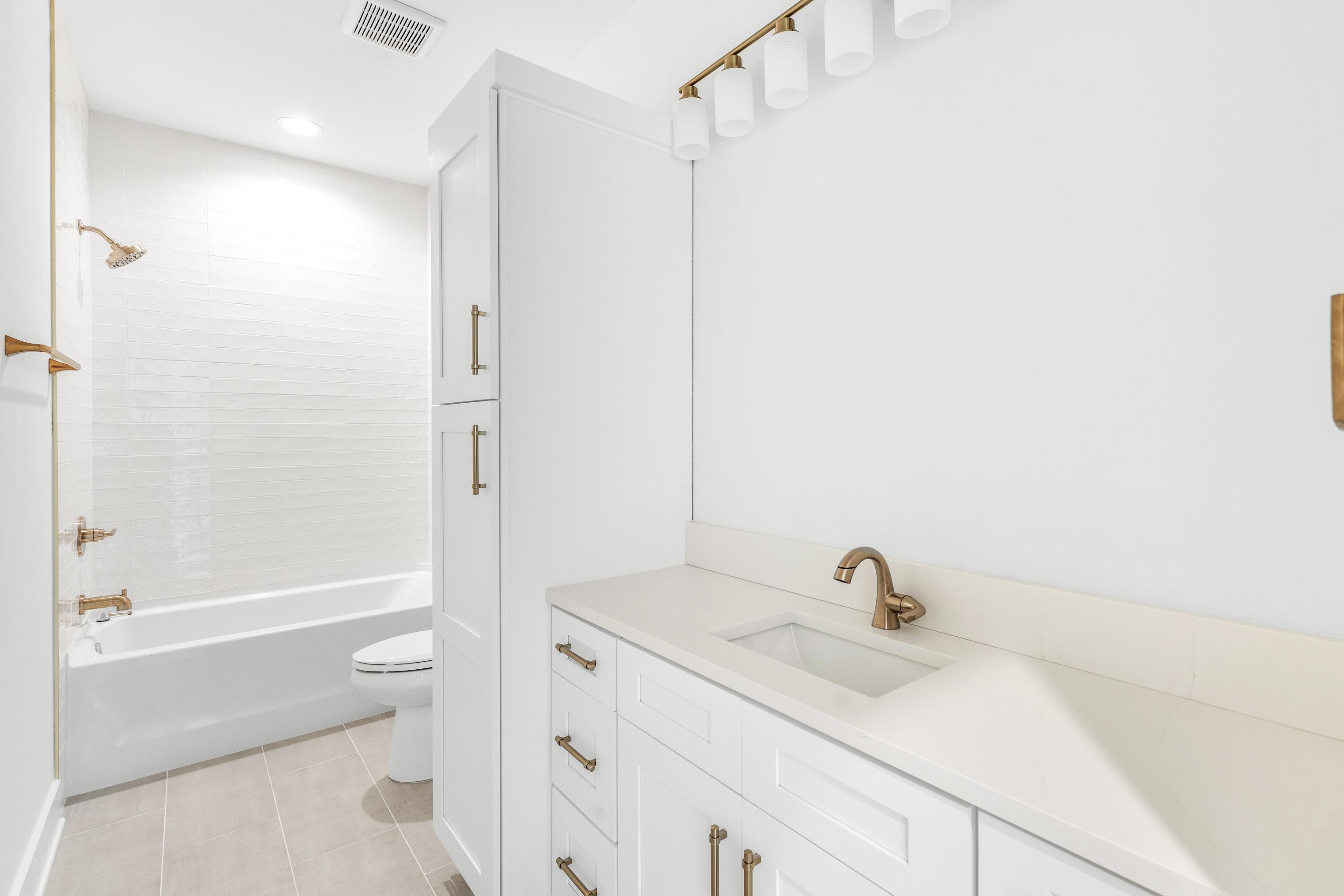 160 Clarke Hl Road Freeport, FL 32439 - Photo 10 of 34 a bathroom with a sink toilet vanity and shower