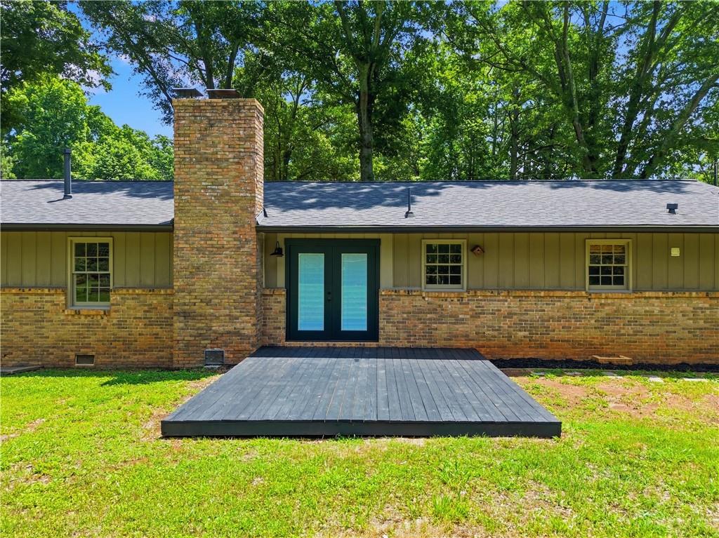 125 Childers Road Canton, GA 30115 - Photo 39 of 48 a front view of a house with a yard