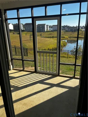 a view of a door and a window