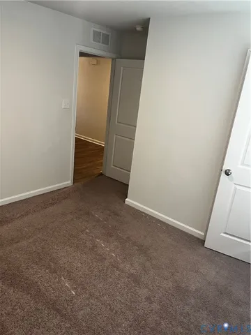 an empty room with a door