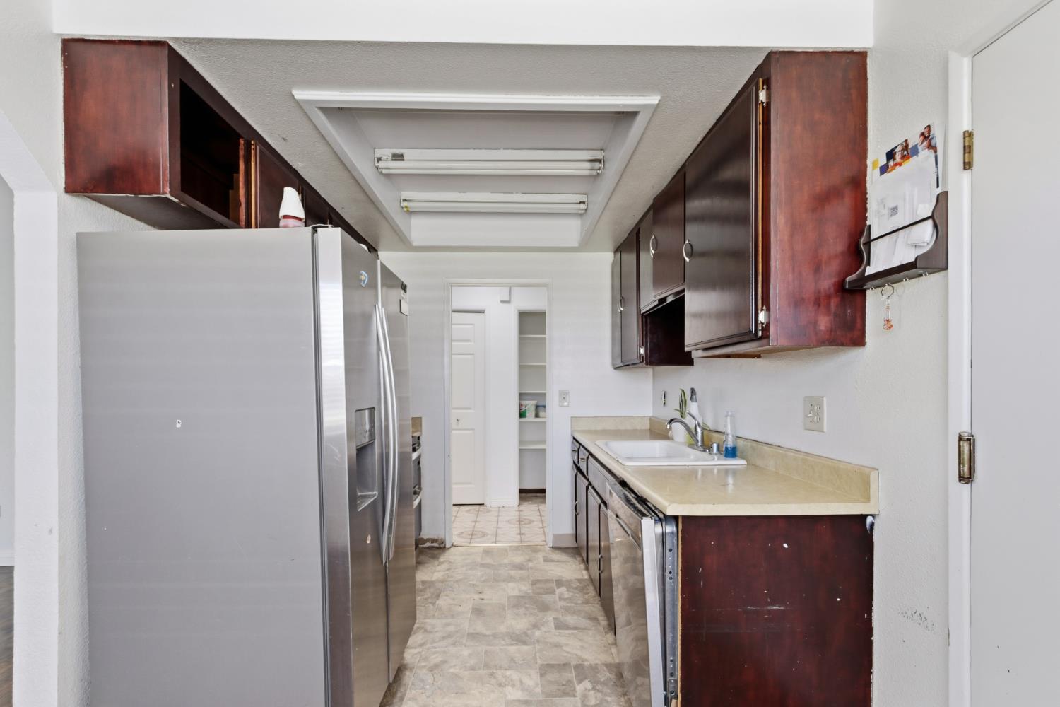7208 7th Street Rio Linda, CA 95673 - Photo 8 of 41 a bathroom with a sink and a mirror