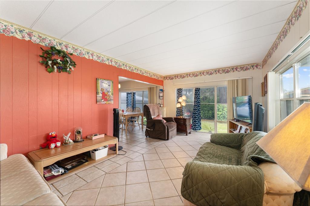 1877 C 478A Webster, FL 33597 - Photo 15 of 65 a living room with furniture