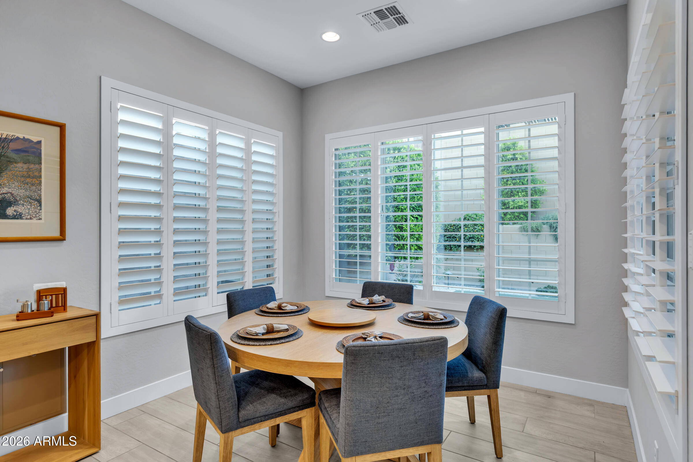 622 West Deer Creek Road Phoenix, AZ 85048 - Photo 12 of 39 a view of a dining room with furniture and window