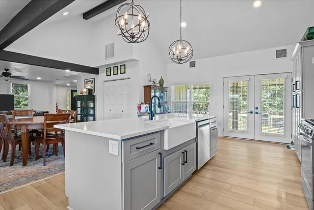 a large kitchen with a large island in it