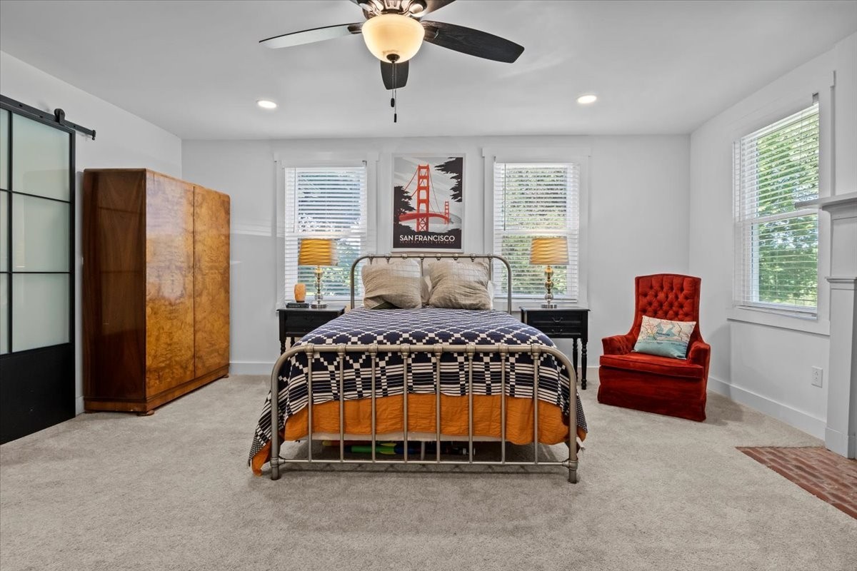 1030 Upper Creek Road Vanleer, TN 37181 - Photo 18 of 38 a bedroom with a bed and window