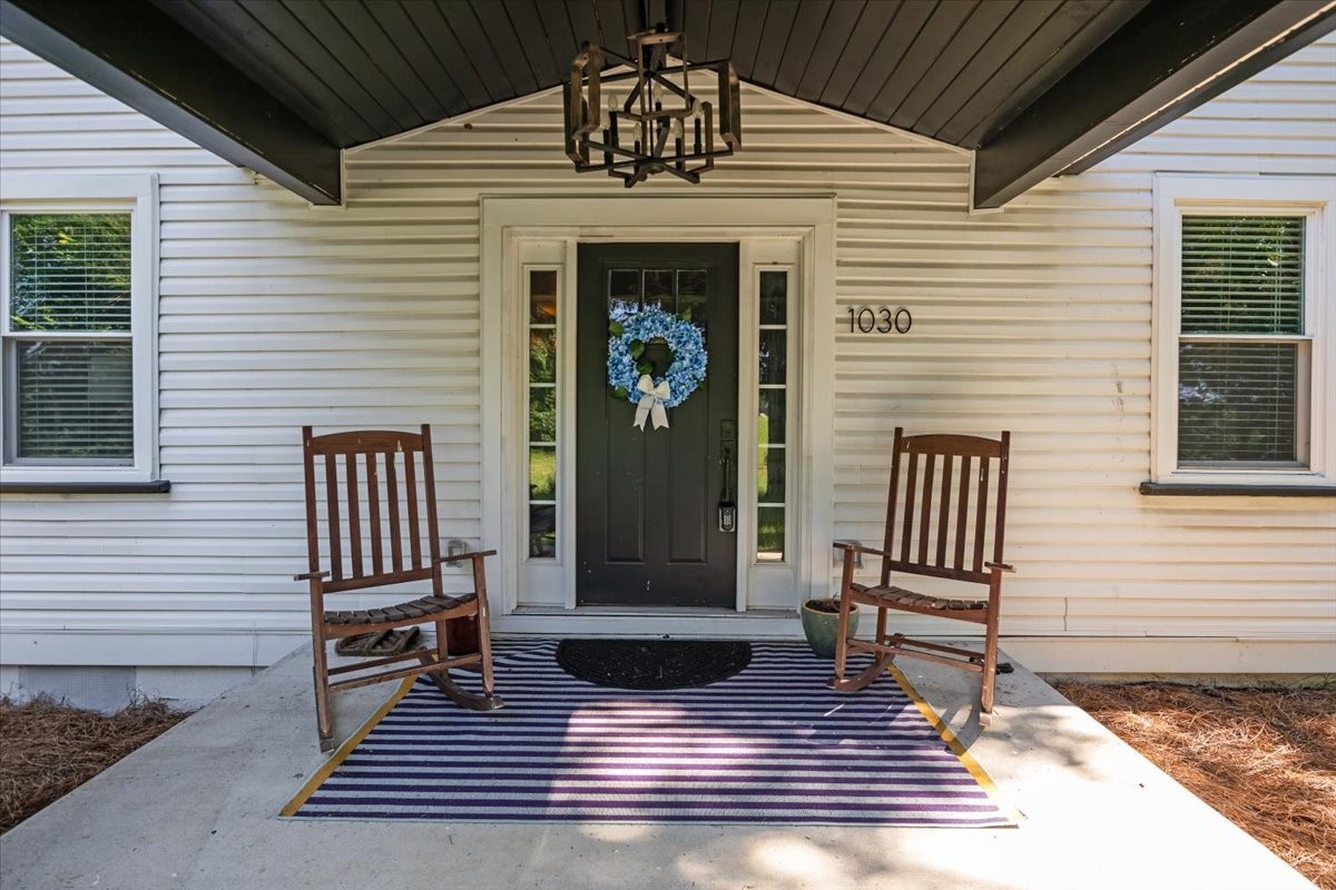 1030 Upper Creek Road Vanleer, TN 37181 - Photo 2 of 38 a view of a door of the house with wooden floor and fence