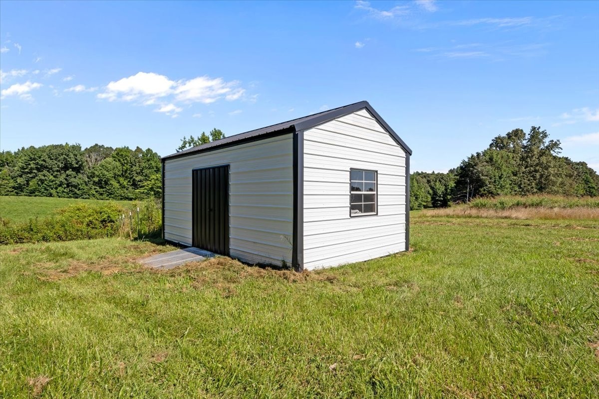 1030 Upper Creek Road Vanleer, TN 37181 - Photo 31 of 38 a view of a backyard of the house