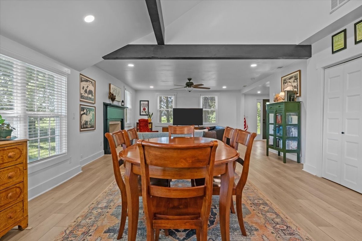 1030 Upper Creek Road Vanleer, TN 37181 - Photo 10 of 38 a view of a dining room with furniture window and wooden floor