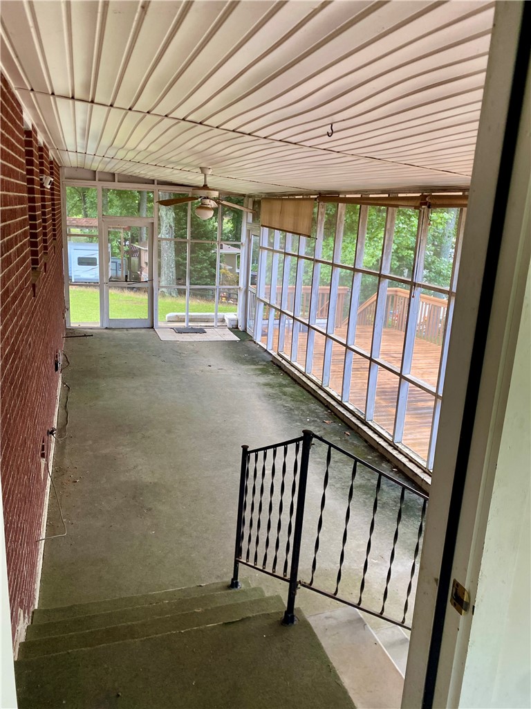 101 Deep Water Point Anderson, SC 29621 - Photo 27 of 34 A versatile screened-in porch offers a peaceful retreat with verdant outdoor views.
