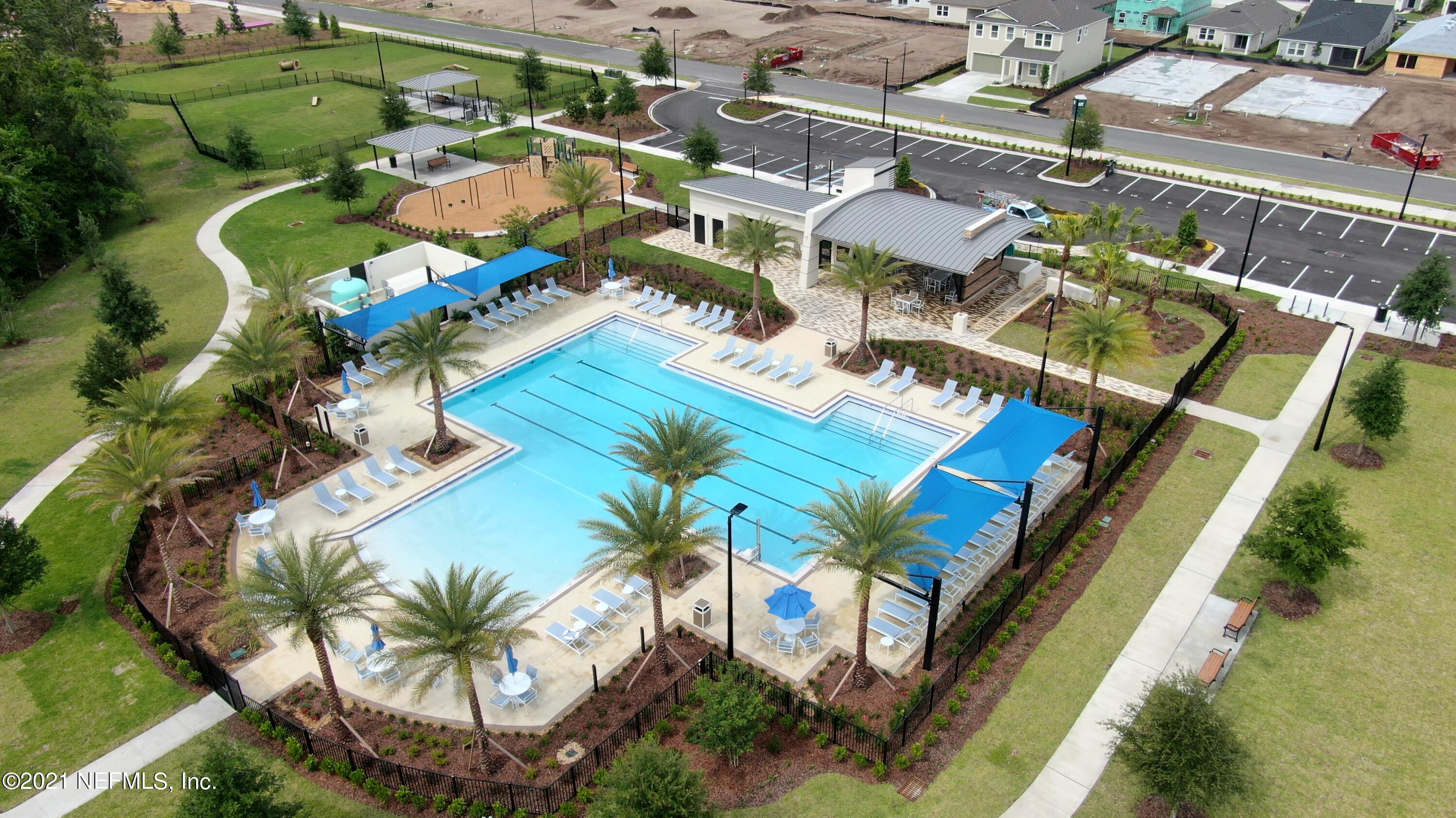 13161 Dunwick Road Jacksonville, FL 32256 - Photo 3 of 25 an aerial view of residential houses with outdoor space and swimming pool