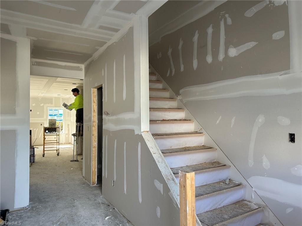 3256 Alyssa Way High Point, NC 27265 - Photo 3 of 26 Iron rails on hardwood stairs