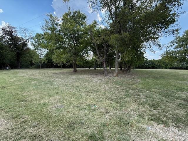 751 Southeast 1st Street Cooper, TX 75432 - Photo 4 of 16 a view of an outdoor space with a lake view