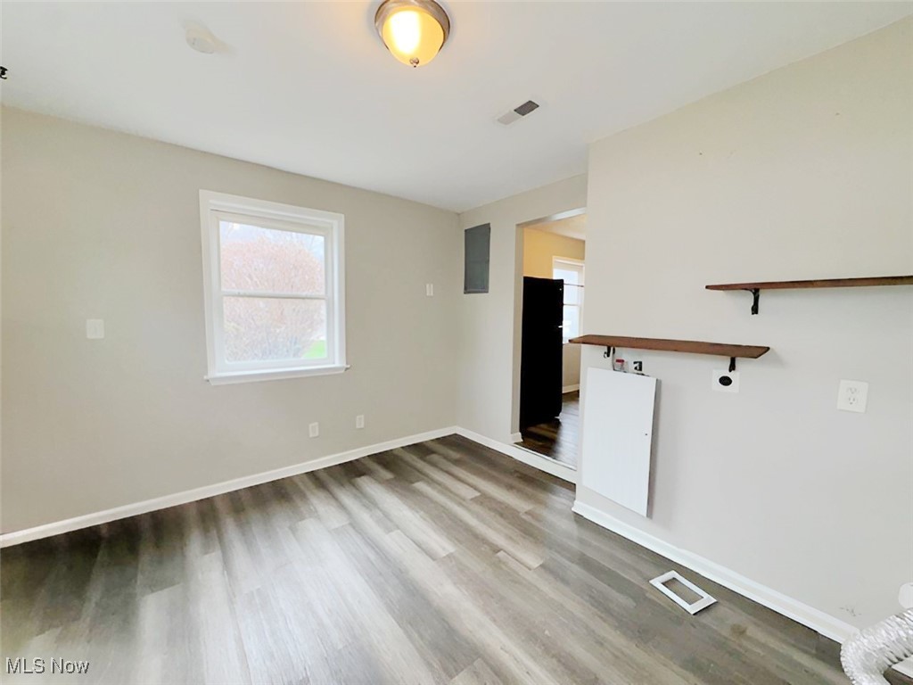 4842 Marigold Road Mentor, OH 44060 - Photo 10 of 13 Unfurnished living room featuring hardwood / wood-style flooring