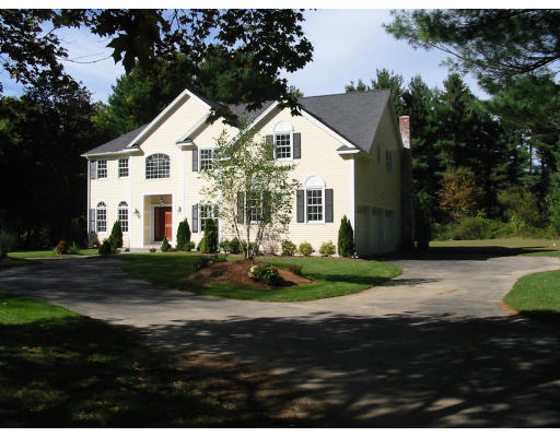 72 Plain Road Wayland, MA 01778 - Photo 3 of 14 a view of white house with garden