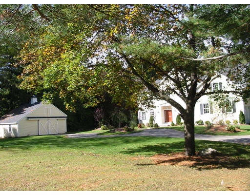 72 Plain Road Wayland, MA 01778 - Photo 6 of 14 a view of a house with backyard