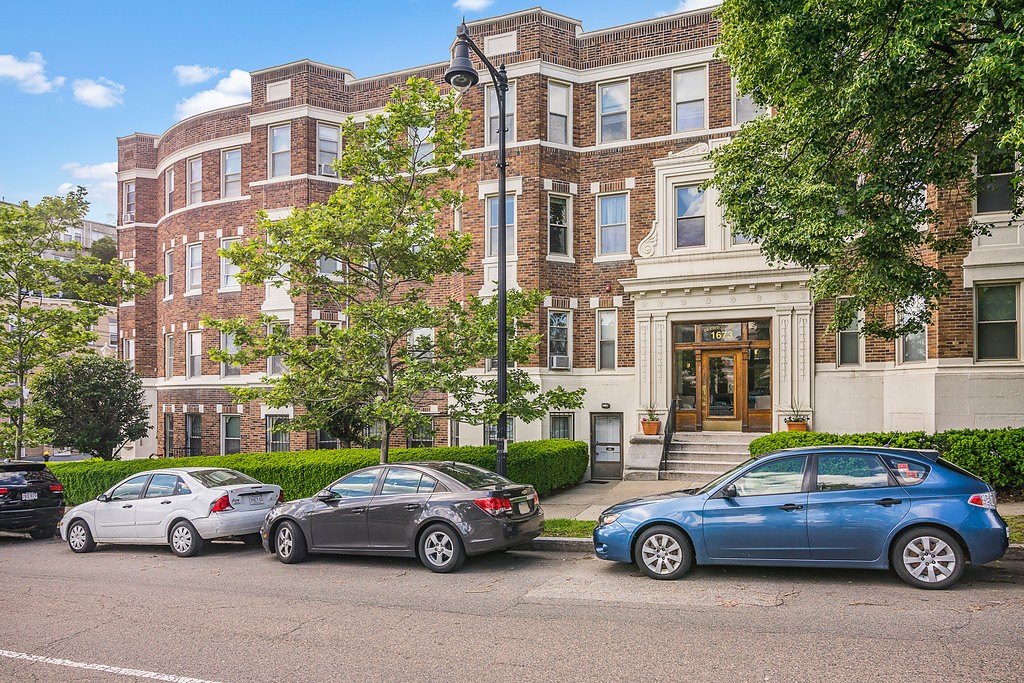 1673 Commonwealth Avenue, Unit 3 Boston, MA 02135 - Photo 2 of 10 a car parked in front of a building