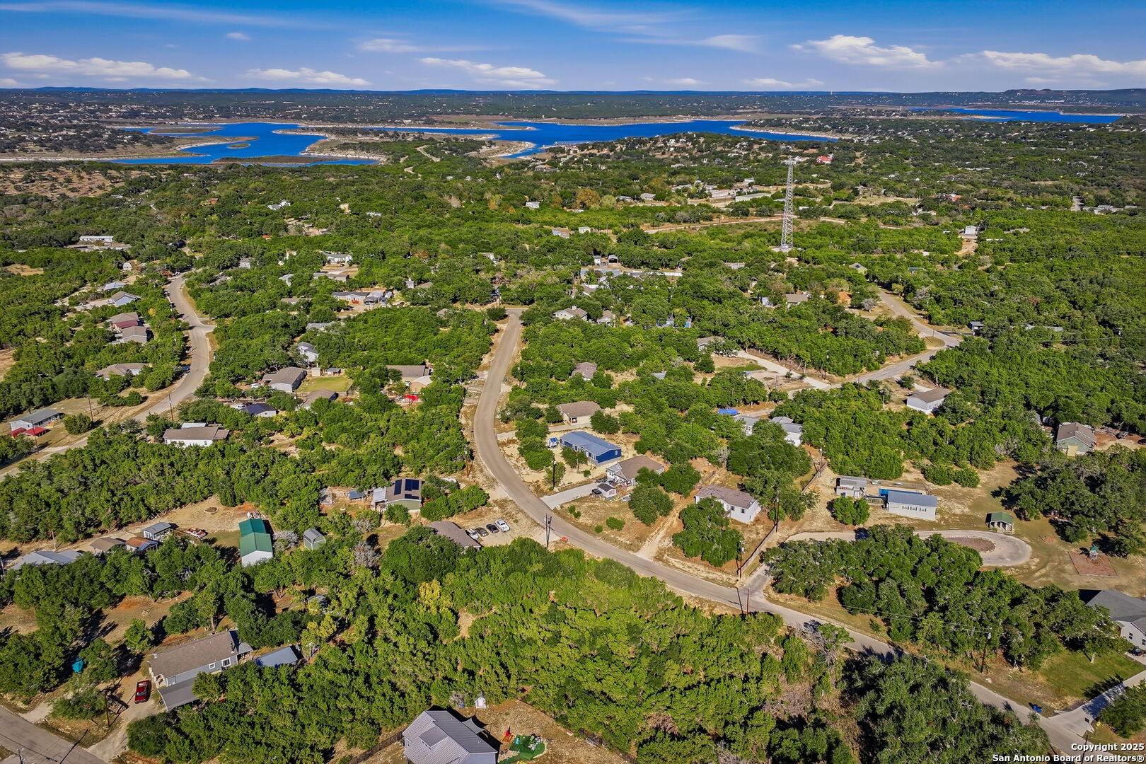 354 Buck Run Pass Canyon Lake, TX 78133 - Photo 16 of 16 a view of a field with an outdoor space