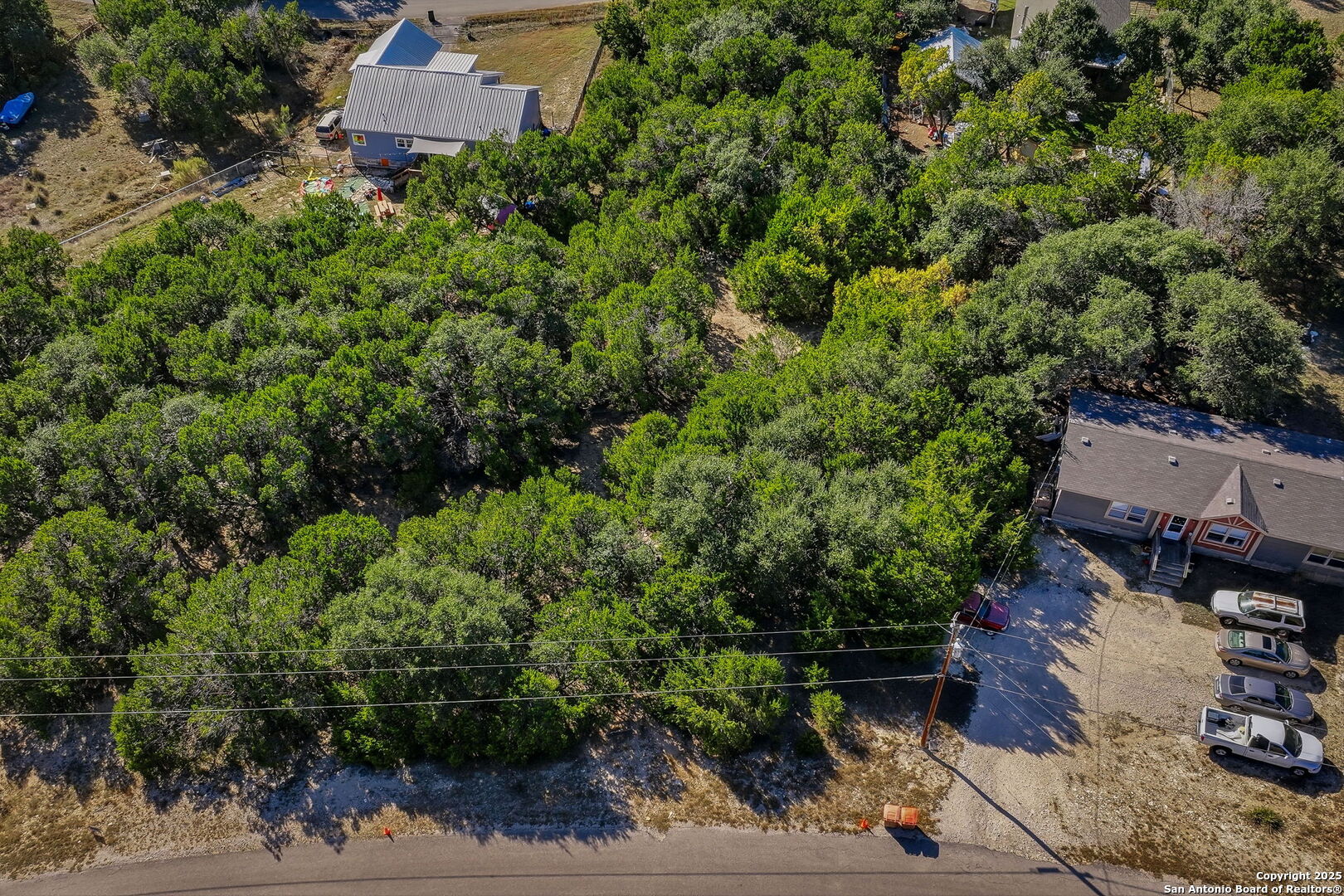354 Buck Run Pass Canyon Lake, TX 78133 - Photo 8 of 16 an aerial view of a house