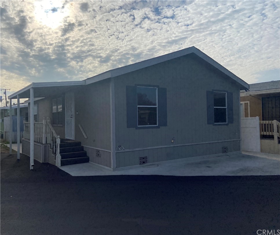 10513 Magnolia Avenue, Unit C2 Riverside, CA 92505 - Photo 1 of 1 a view of outdoor space and deck