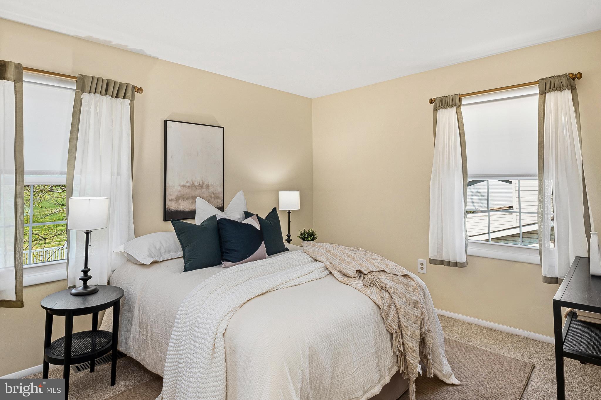 982 Fall Cir Way Gambrills, MD 21054 - Photo 12 of 32 a bedroom with a bed and a window