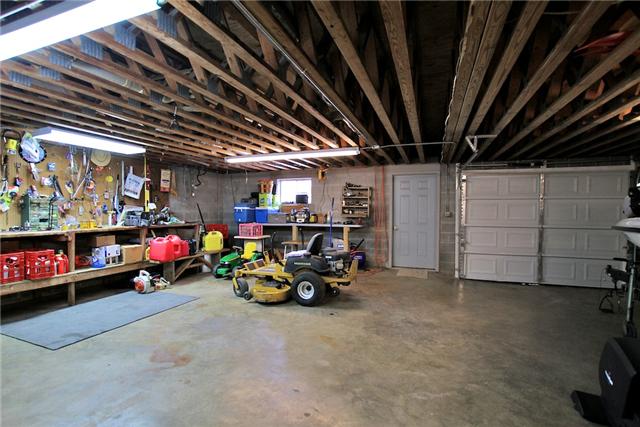 1174 Dimple Road Chapmansboro, TN 37035 - Photo 19 of 20 Basement features one garage large enough for boat and plenty of more space for all the extras