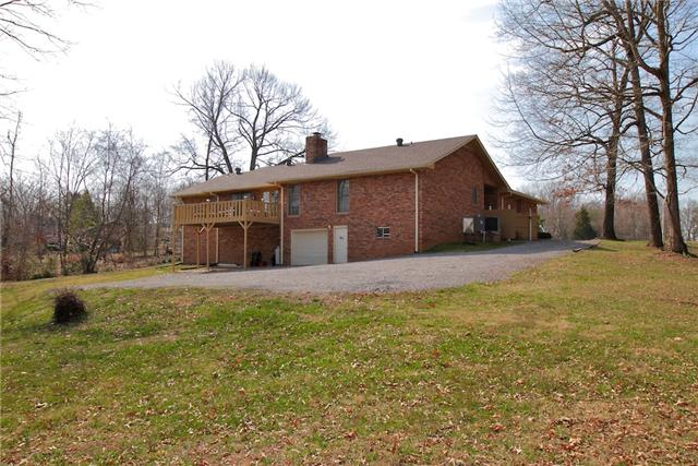 1174 Dimple Road Chapmansboro, TN 37035 - Photo 5 of 20 The rear of the home is just as attractive as the front