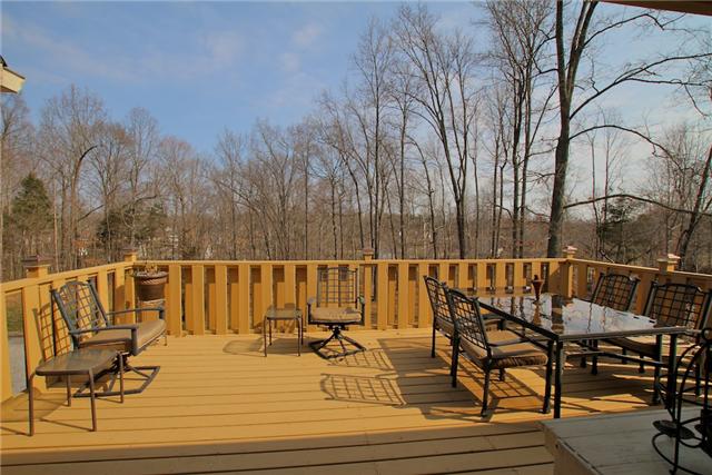 1174 Dimple Road Chapmansboro, TN 37035 - Photo 6 of 20 Deck is ready for morning coffee or evening entertaining