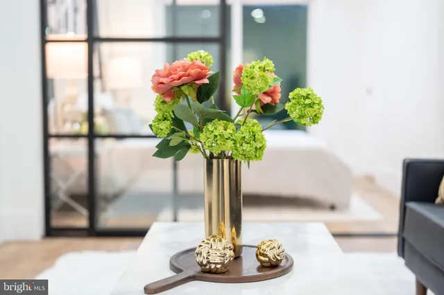 a vase of flowers sitting on a table