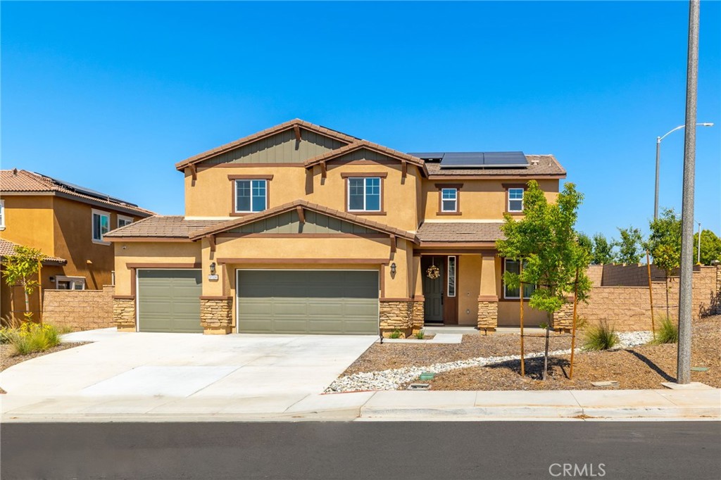31124 Hanover Lane Menifee, CA 92584 - Photo 2 of 39 a front view of a house with a yard