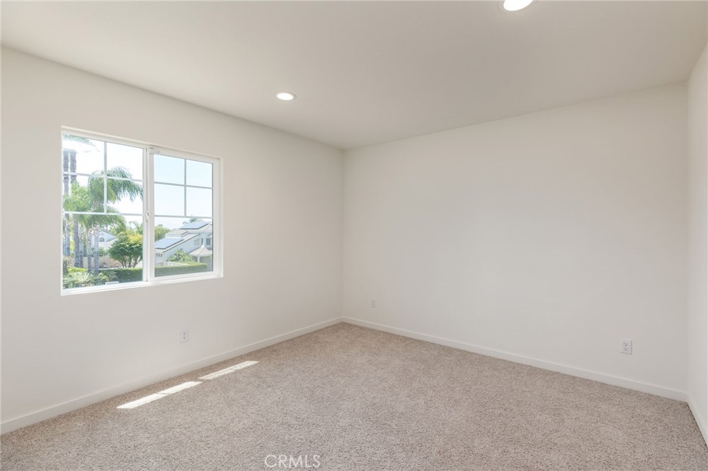 31124 Hanover Lane Menifee, CA 92584 - Photo 22 of 39 an empty room with a window