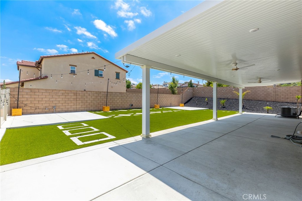 31124 Hanover Lane Menifee, CA 92584 - Photo 26 of 39 a view of a back yard of the house