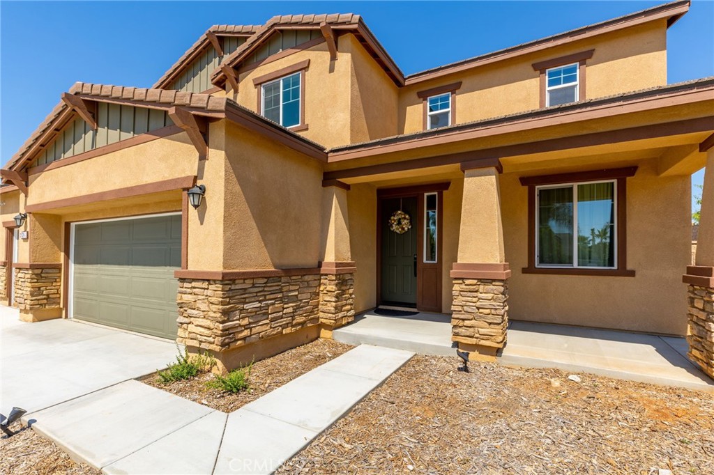 31124 Hanover Lane Menifee, CA 92584 - Photo 3 of 39 a front view of a house