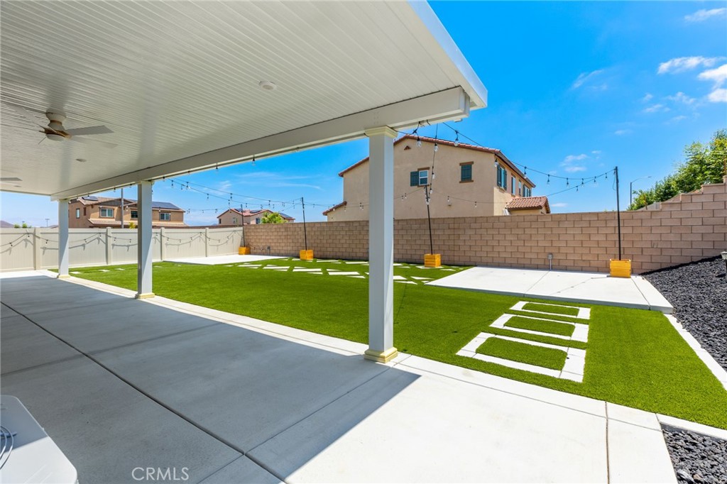 31124 Hanover Lane Menifee, CA 92584 - Photo 29 of 39 a view of a backyard with a garden and plants
