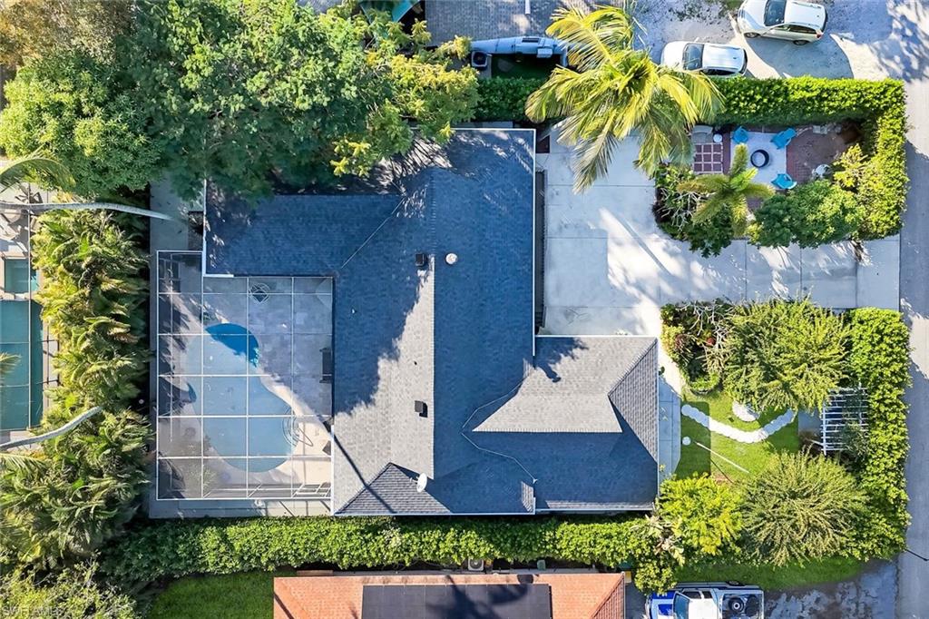 4352 Parrot Avenue Naples, FL 34104 - Photo 25 of 27 an aerial view of house with yard swimming pool and outdoor seating