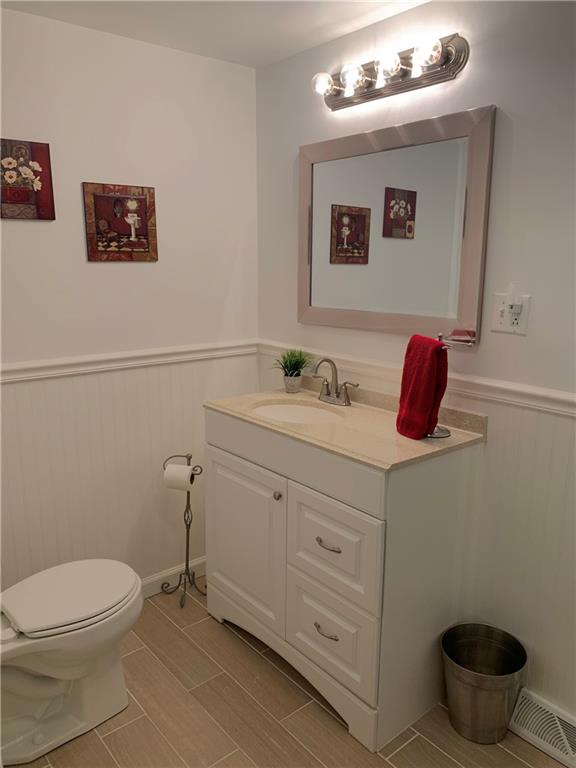 1708 Dime Road Vandergrift, PA 15690 - Photo 14 of 25 a bathroom with a toilet sink and mirror
