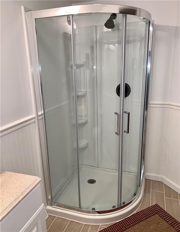 1708 Dime Road Vandergrift, PA 15690 - Photo 15 of 25 a bathroom with a glass shower door