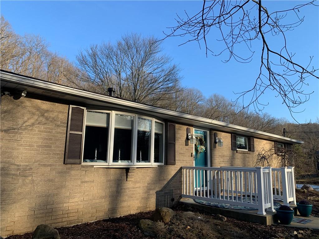 1708 Dime Road Vandergrift, PA 15690 - Photo 2 of 25 a view of a house with a window