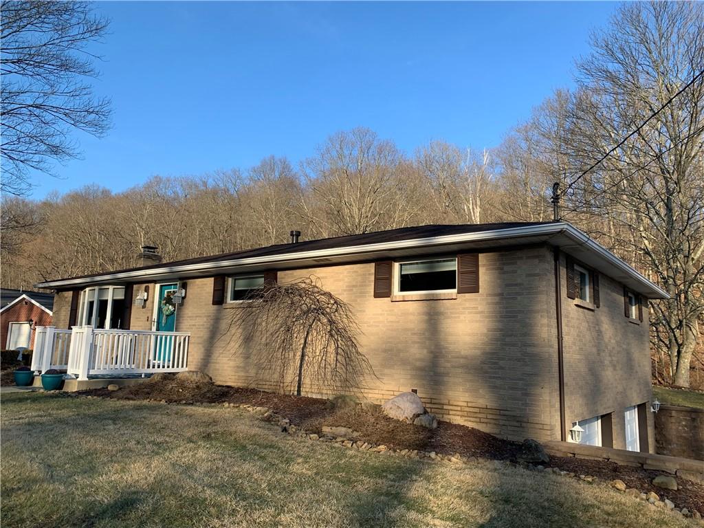 1708 Dime Road Vandergrift, PA 15690 - Photo 3 of 25 a view of a house with a yard