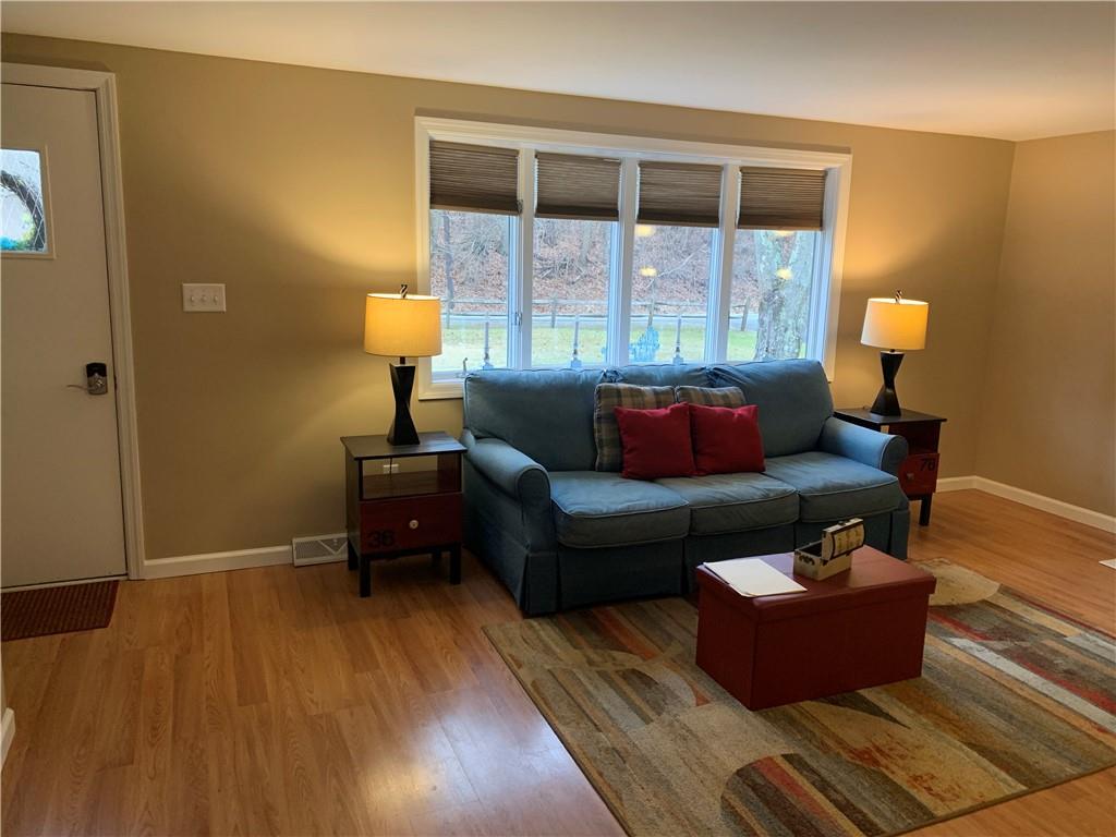 1708 Dime Road Vandergrift, PA 15690 - Photo 7 of 25 a living room with furniture and a window