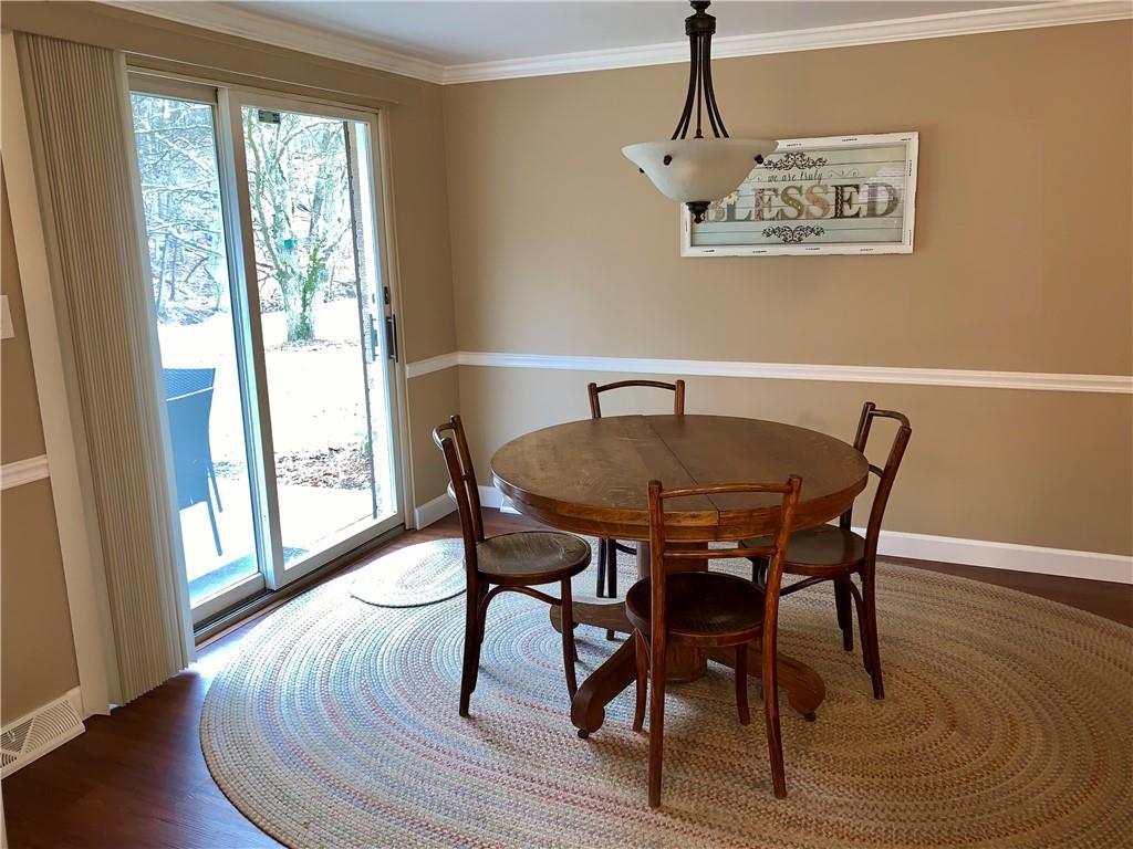 1708 Dime Road Vandergrift, PA 15690 - Photo 8 of 25 a view of a dining room with furniture window and wooden floor