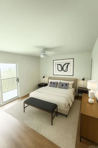 a bedroom with a bed and with a mirror