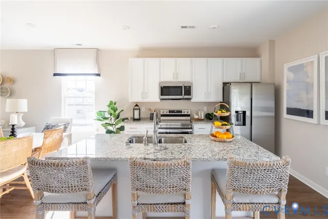 a kitchen with a granite counter tops and a sink