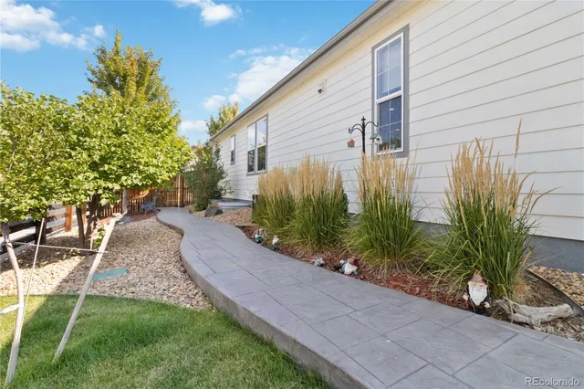 a view of a backyard with a garden