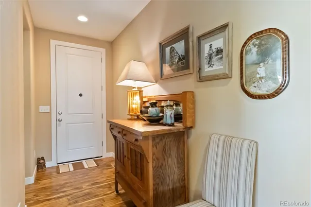 a room with furniture and mirror